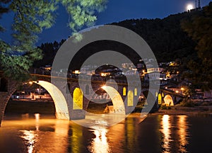 Bridge over the river osum at night berat albania europe