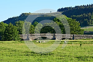 Bridge over River Wharfe at Conistone in Evening Sunlight, Wharfedale, Yorkshire Dales, England, UK