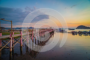 bridge over sea for fishing and walking at Sunset time. photo