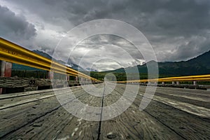 Bridge over Susitna river under the clouds