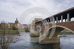 Bridge over Ticino river in Pavia at overcast day
