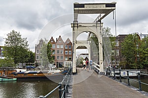 Bridge over typical canal in Amsterdam suburb