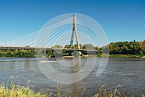 Bridge over the Vistula river in Warsaw, Poland, in a bright sunny day