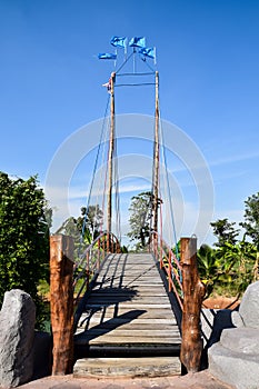 Bridge in the palm and fruit garden