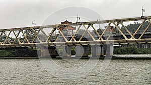 Bridge on the Perfume River, Hue, Vietnam, photographed from tour boat