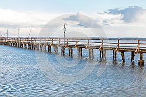 Bridge or pier across an expanse of sea