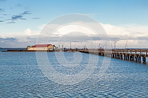 Bridge or pier across an expanse of sea