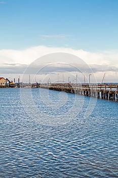 Bridge or pier across an expanse of sea