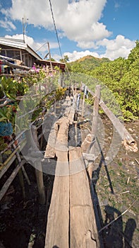 The bridge of the plaques in the poor district of Coron town. Busuanga. Views of the city`s Slums from the river.