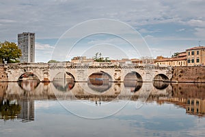 The bridge Ponte d `Augusto in Rimini, Italy photo