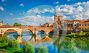 Bridge Ponte Pietra in Verona on Adige river photo