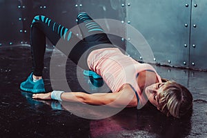 Bridge pose sporty woman doing fitness workout