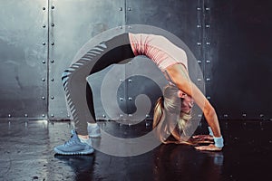 Bridge pose sporty woman doing fitness workout