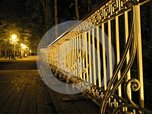 Bridge railing at night