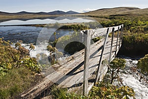 Bridge and reflction on water in Iceland