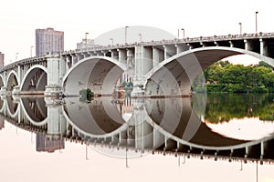 Bridge reflection in the calm water of Mississippi river