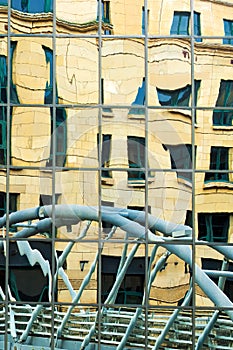 Bridge reflexion in a glass business building front