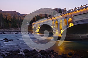 Bridge and river at dusk
