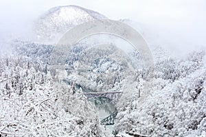 Bridge on a river with snow mountain, Fukushima.