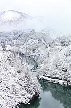 Bridge on a river with snow mountain, Fukushima.