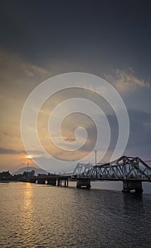 Bridge and river at sunset in kampot cambodia