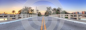 Bridge roadway over a riverway that leads to the ocean on Marco Island