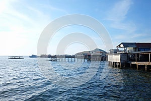 Bridge of Samaesarn port in daytime view and blue sky photo