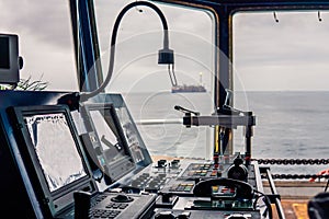 Bridge ship equipment. telegraph handles vhf radio, navigation devices