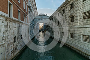 The Bridge of Sighs, famous bridge connects the DogeÃ¢â¬â¢s Palace to the prison, in Venice, Italy with gondolas