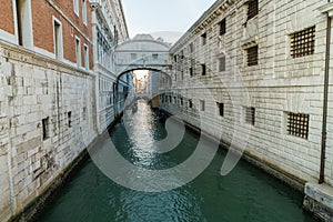 The Bridge of Sighs, famous bridge connects the DogeÃ¢â¬â¢s Palace to the prison, in Venice, Italy with gondolas