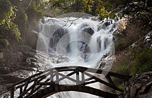 Bridge silhouette and Waterfall