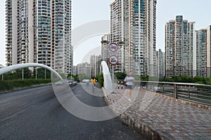 A bridge and some modern buildings in Putuo district over the Wusong river. Residential skyscrapers in Shanghai, China