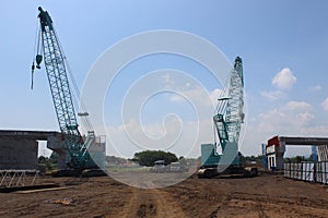 Bridge Structure with Crane heavy Machine on Toll road