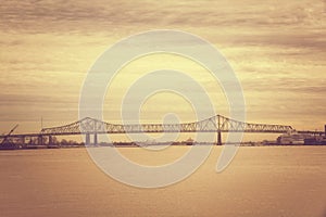 Bridge of sunset on Mississippi River in New Orleans Louisiana