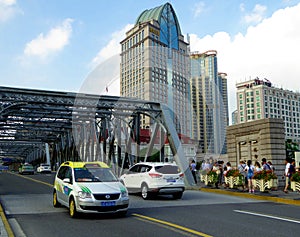 Waibaidu Bridge with tall modern buildings background in Shanghai