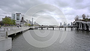 Bridge to new NYC landmark little Island at pier 55. New park in Manhattan