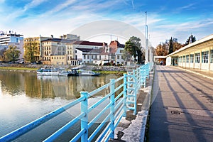 Bridge to spa island in Piestany + Vah river + riverbank + blue