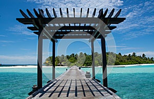 Bridge to the tropical island at Maldives
