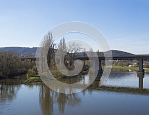 Bridge for train over river Berounka, spring suny day