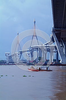 Bridge and tug-boat in Bangkok, Thailand