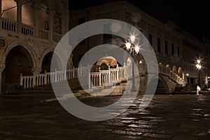 Bridge via the Palace channel, a lamp and a wall of Doges Palace