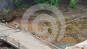 The bridge was damaged due to flash floods