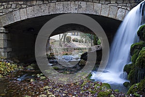 Bridge with waterfall