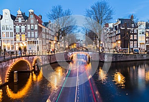 Bridges at the Leidsegracht and Keizersgracht canals intersection in Amsterdam photo
