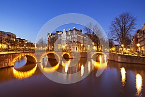 Bridges over canals in Amsterdam at night