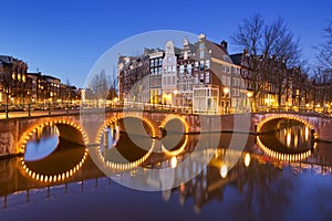 Bridges over canals in Amsterdam at night