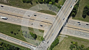 Bridges, roads top aerial view of highway of urban elevated road junction and interchange overpass in city with traffic