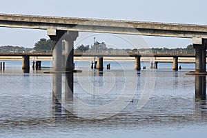 Bridges And Water Reflection Over The Great Brak River photo