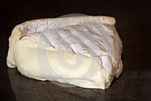 Brie Cheese on Slate Background