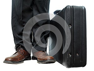 Briefcase next to shoes